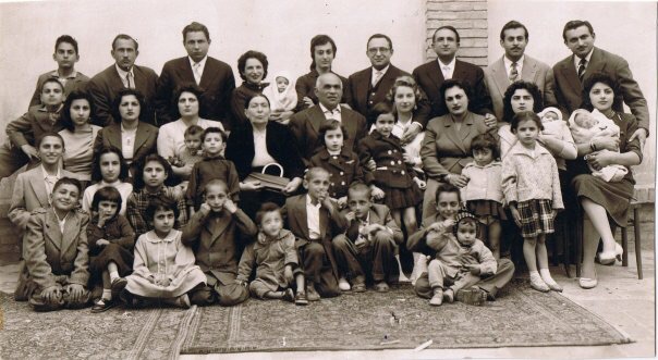 Portrait of a Tehrani Jewish Family Commemorating the Return of their Son and his French wife from Paris, 1954. Anonymous. Ajam Digital Archive, http://www.ajammc.com/