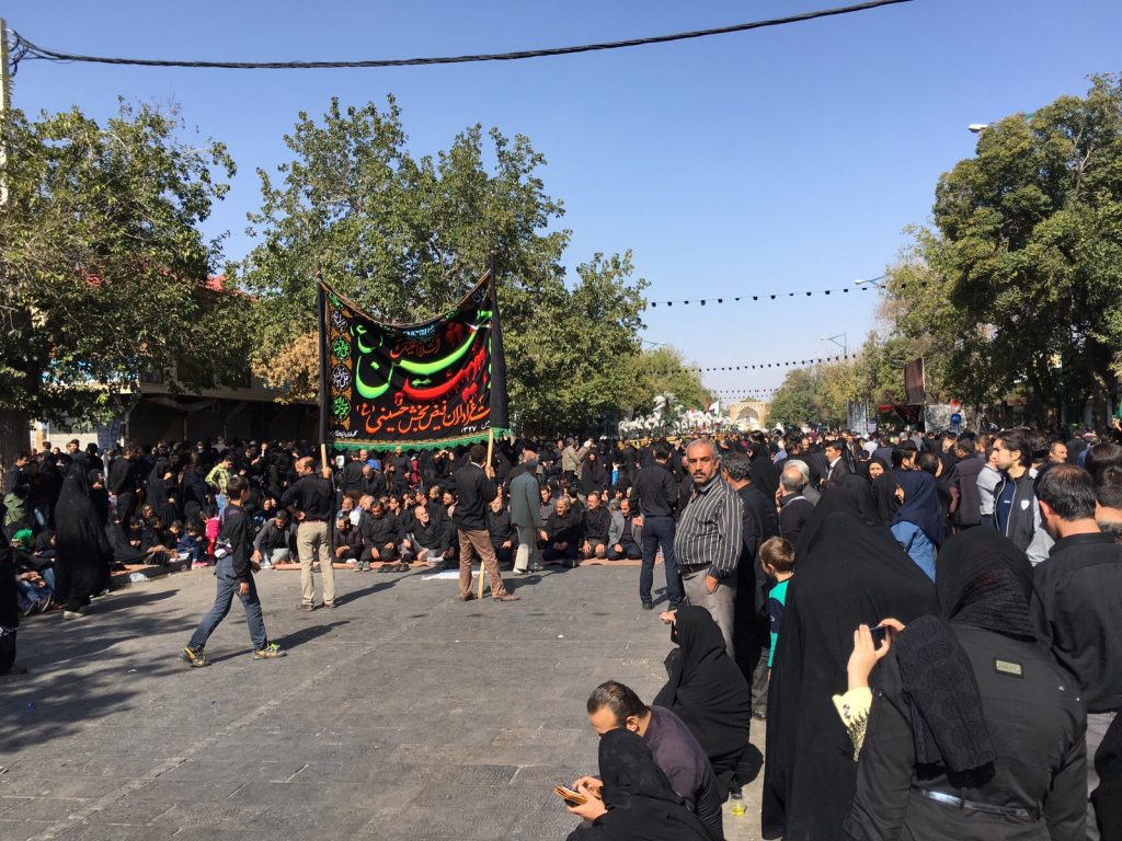 Ashura processions in the streets are paused for noon prayers in Qazvin