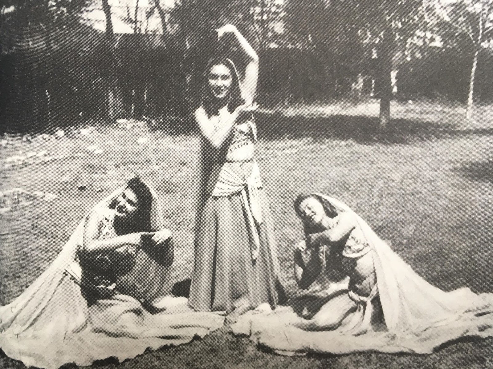 Persian female. Historical city or theatre costumes.